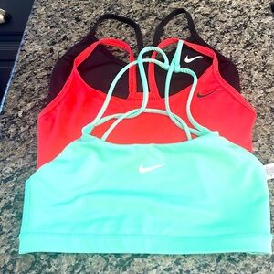 Three size small Nike sports bras